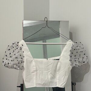 Crop top with sheer sleeve